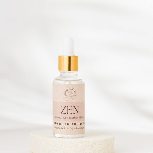 Bottle of 'Zen' diffuser refill on a white background